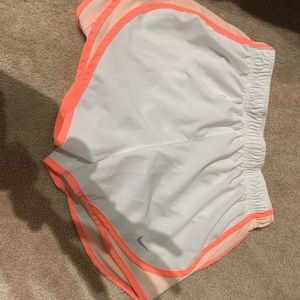 pink and white nike running shorts